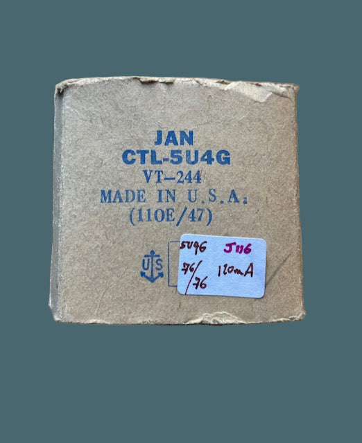 Cardboard box with text and a label on a wooden surface