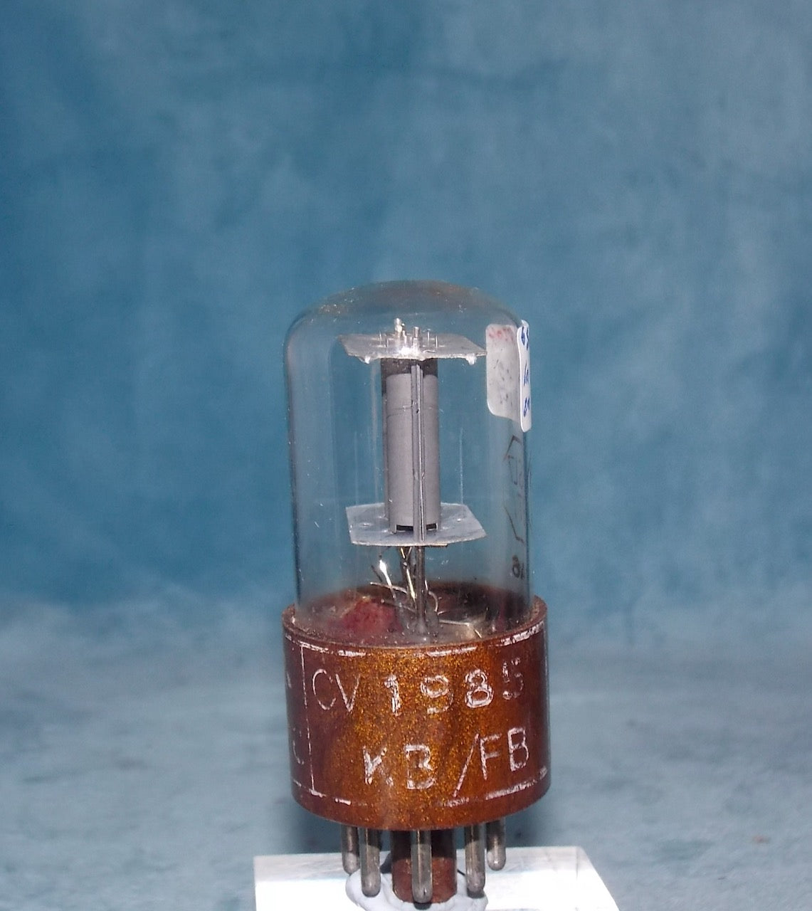 CV1985, BRIMAR, FOOTSCRAY, MIL SPEC 6Sl7GT, BROWN MICANOL BASE, WHITE MILITARY CARTOUCHE WITH DATE CODE FOR DECEMBER 1956, ECC32, 6SL7