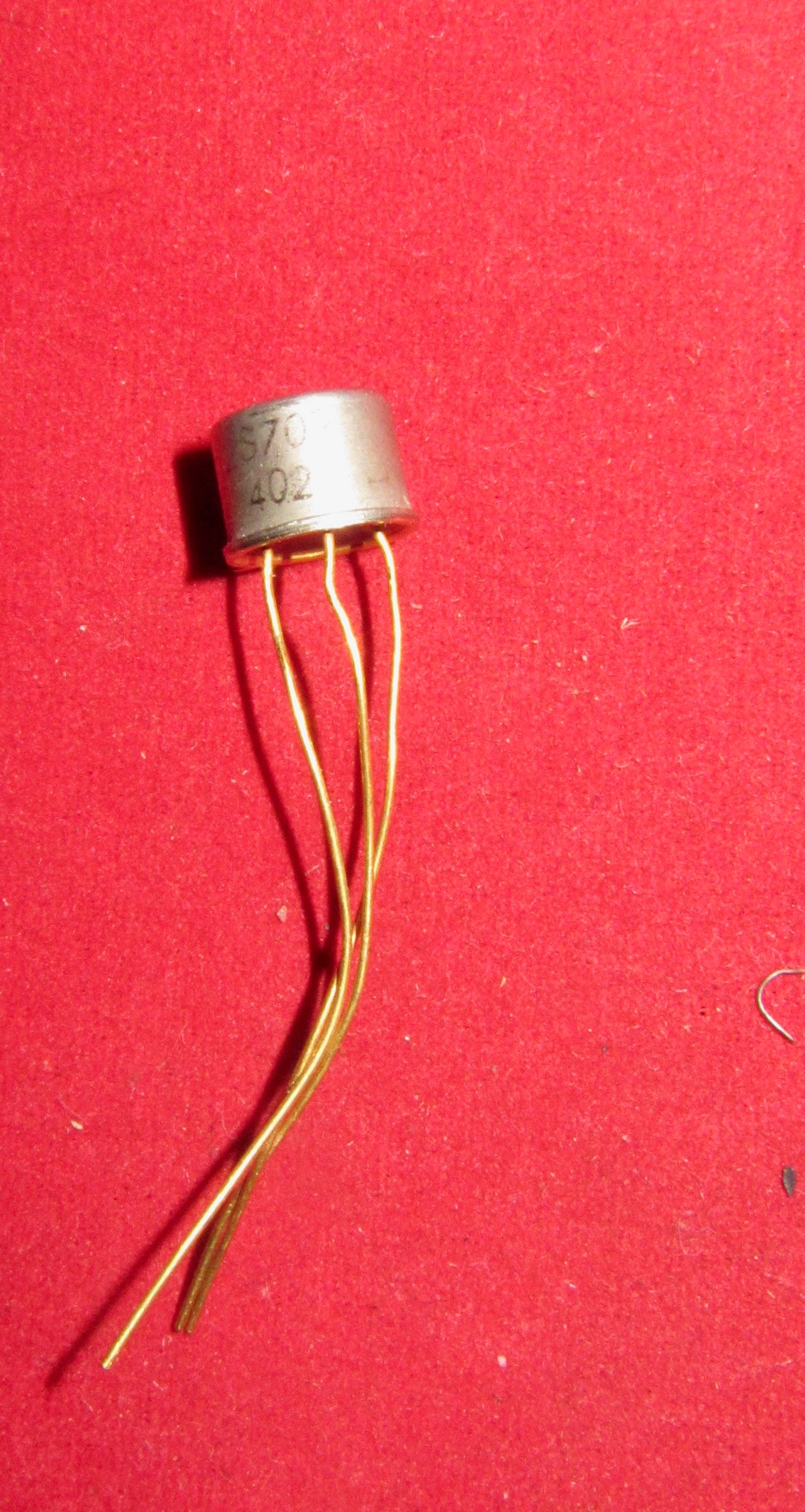 2S702, silicon NPN transistor, TO-5 can, Texas Instruments