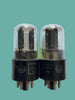 Two vacuum tubes with RCA branding on a white background