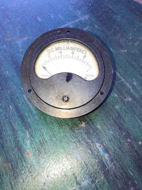 Moving coil meter, 83mm Dia, Scaled 0-10 DC mA, 1945 Dated