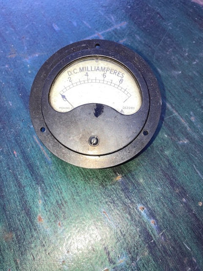Moving coil meter, 83mm Dia, Scaled 0-10 DC mA, 1945 Dated