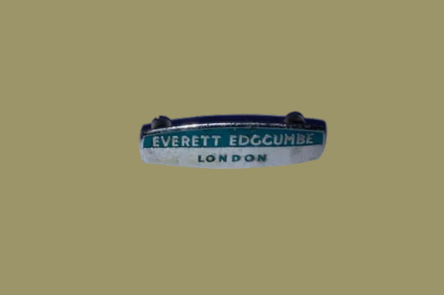 EVERETT EDGCUMBE, METAL,  BLUE LETTERS ON CHROMED GROUND, 2  NUT MOUNTING, 10 x 40 mm