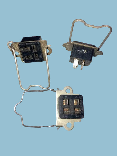 MINIATURE,  JONES SOCKET, CHASSIS MOUNT, 4  SATGGERED PIN, FEMALE, WITH SECURITY BALE, FOR, PYE COMMS,