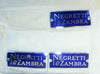 NEGRETTI & ZAMBRA BLUE VITRIFIED ENAMEL & CHROMED BRASS INSTRUMENT BADGES