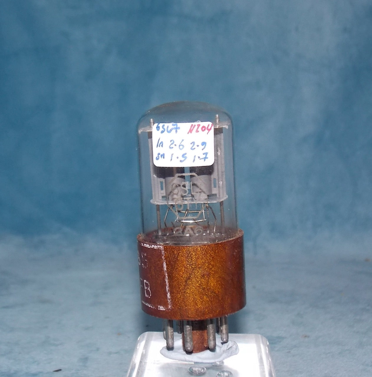 CV1985, BRIMAR, FOOTSCRAY, MIL SPEC 6Sl7GT, BROWN MICANOL BASE, WHITE MILITARY CARTOUCHE WITH DATE CODE FOR DECEMBER 1956,  ECC32,   6SL7