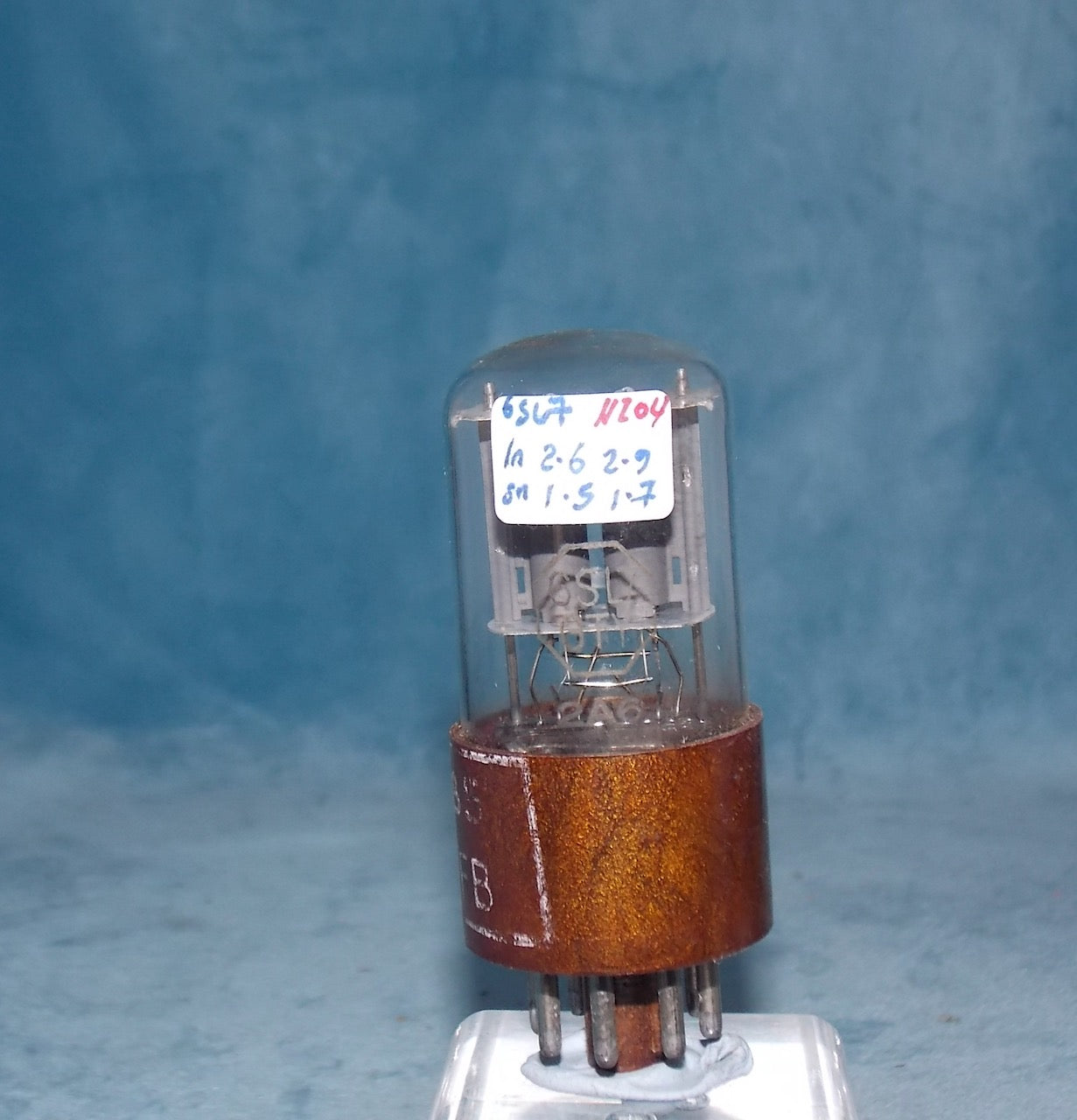 CV1985, BRIMAR, FOOTSCRAY, MIL SPEC 6Sl7GT, BROWN MICANOL BASE, WHITE MILITARY CARTOUCHE WITH DATE CODE FOR DECEMBER 1956,  ECC32,   6SL7