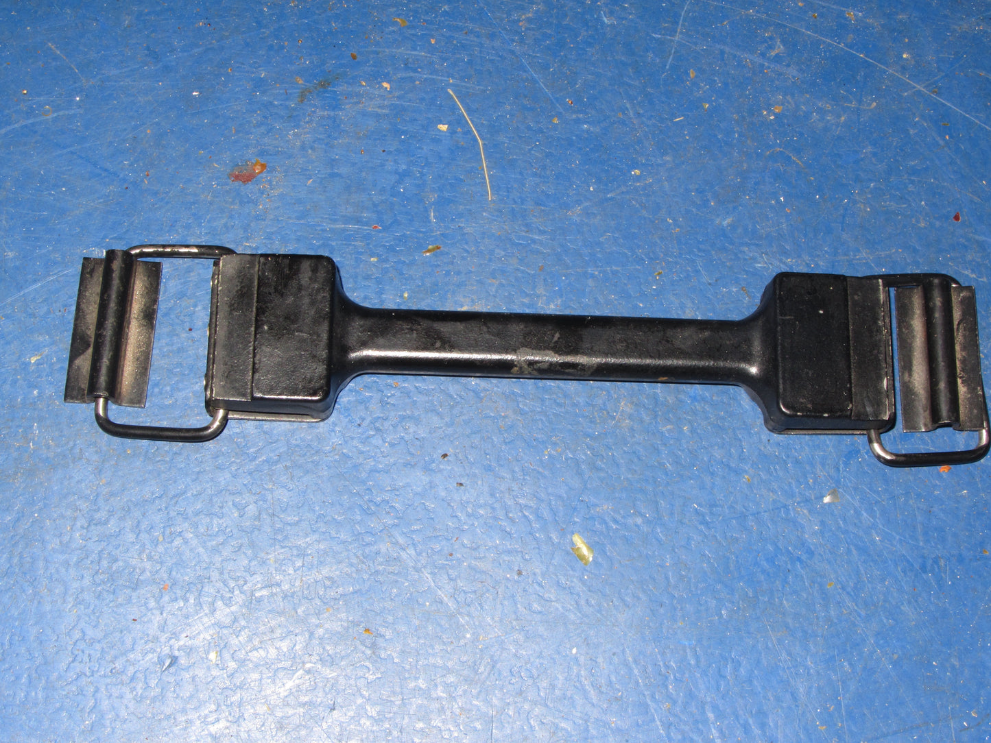 METAL HANDLE,  EX MILITARY? BLACK ENA,EL FINISH WITH SECURING LOOPS AND HANGERS